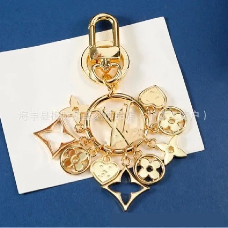 Louis Vuitton Fashionable multi-flower light luxury old flower four-leaf clover alloy sunflower keychain bag pendant decoration chain streetwear outfit product