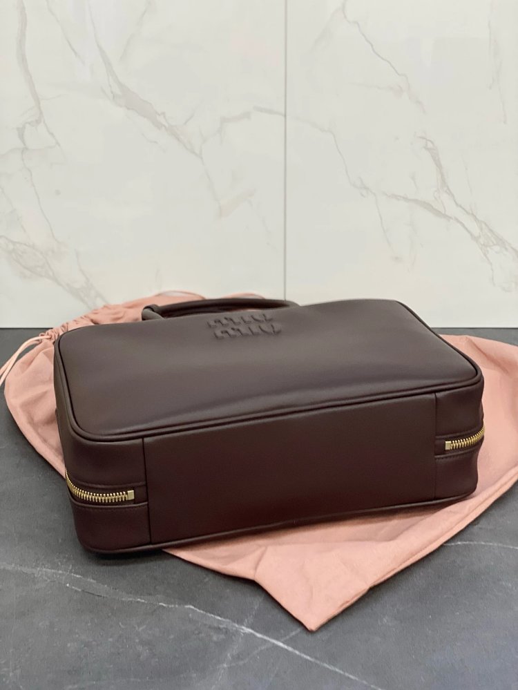 miumiu Original Leather Handheld Official Document Bag for Women 2025 New Large Capacity Retro U | Outfitreps Spreadsheet