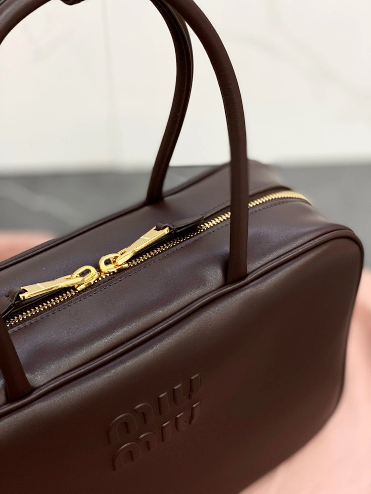 miumiu Original Leather Handheld Official Document Bag for Women 2025 New Large Capacity Retro U | Outfitreps Spreadsheet