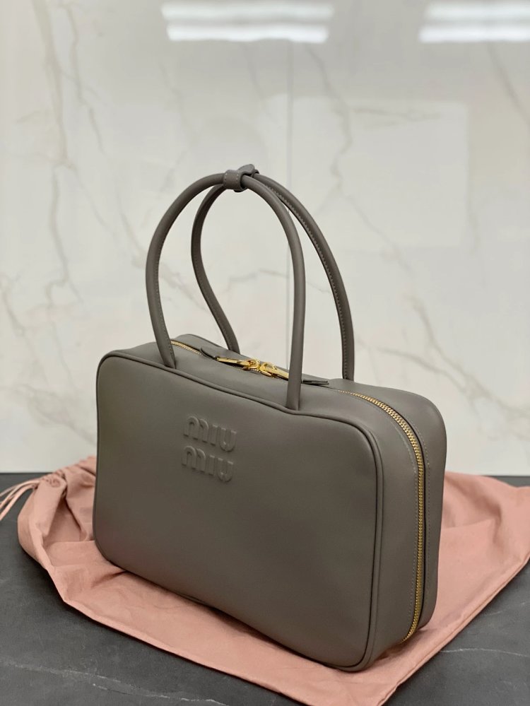 miumiu Original Leather Handheld Official Document Bag for Women 2025 New Large Capacity Retro Under