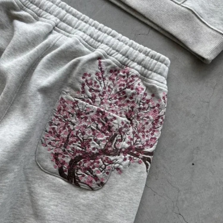 Retro plum blossom embroidered straight pants for men and women, versatile personalized street fashion jeans