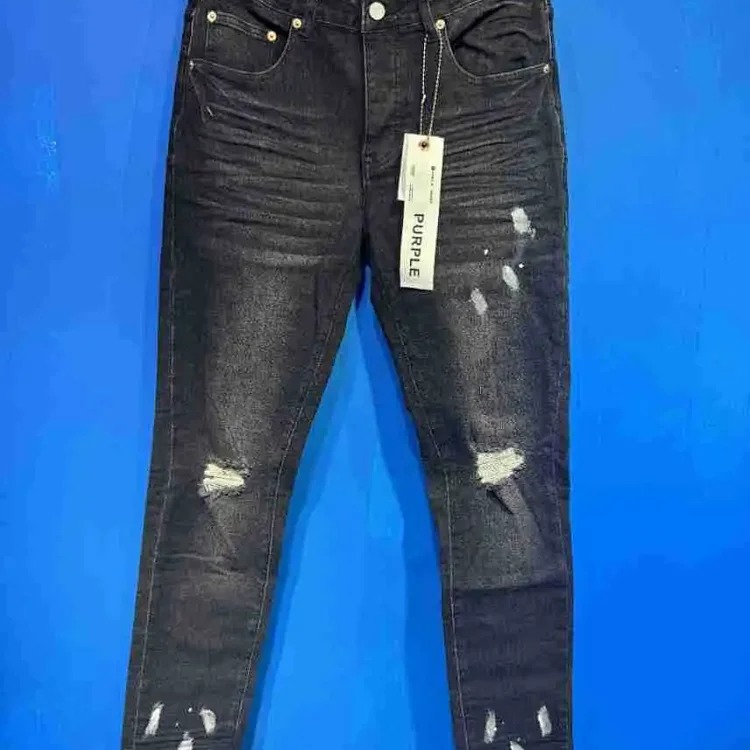Foreign trade new real-shot spot beauty trendy high street casual ripped hole slim fit men and women couples washed denim trousers with slight flares