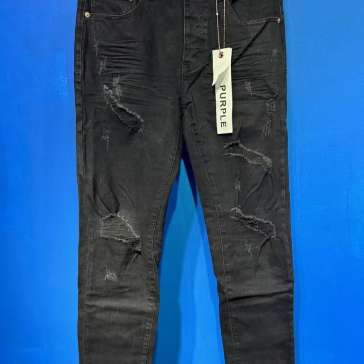 Foreign trade new real-shot spot beauty trendy high street casual ripped hole slim fit men and women couples washed denim trousers with slight flares