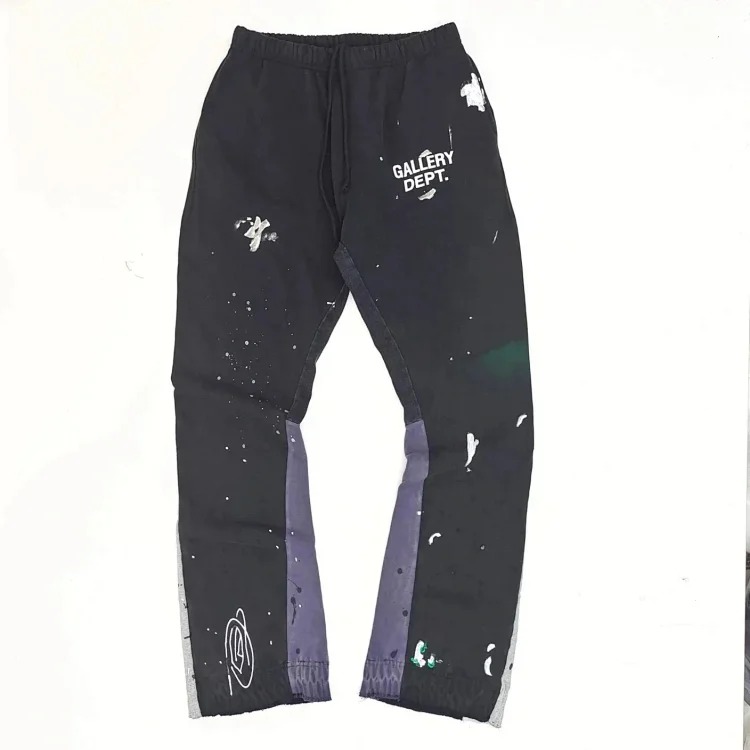 Dept. trousers legs are spliced with multi-colored black letters and white waves