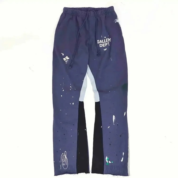Dept. trousers legs are spliced with multi-colored black letters and white waves