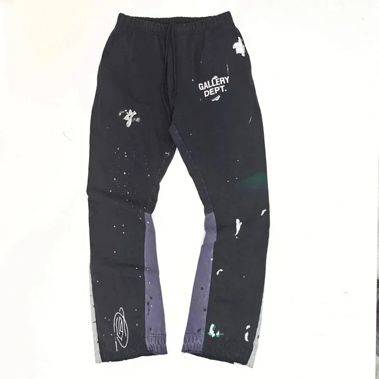Dept. trousers legs are spliced with multi-colored black letters and white waves