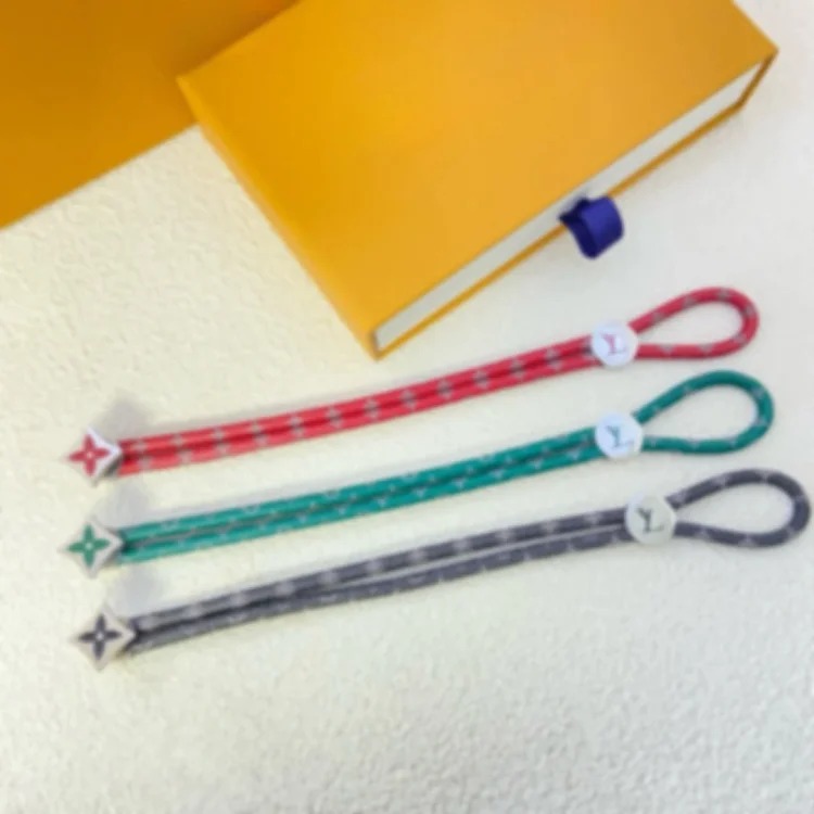 Louis Vuitton Engraved flower presbyopic leather rope adjustable bracelet four-leaf clover printed men and women same style bracelet direct sale