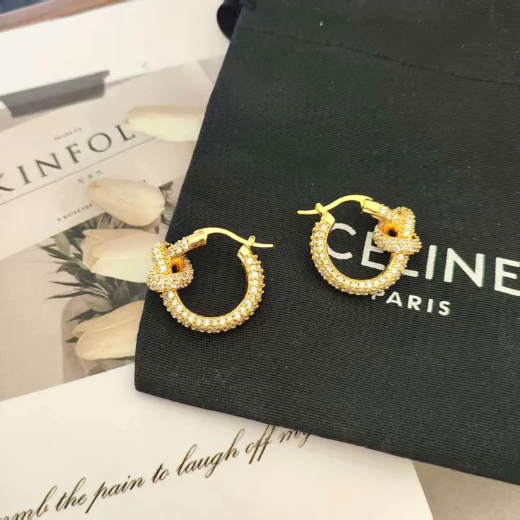 Arc de Triomphe high-end fashion simple full diamond earrings copper gold-plated women's light luxury full diamond jewelry knotted hoop earrings