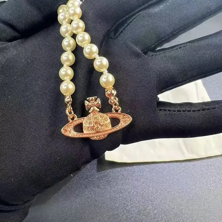 High-quality Western Queen Mother Saturn Pearl Necklace Female niche light luxury choker Vivian Planet Pearl Clavicle Necklace