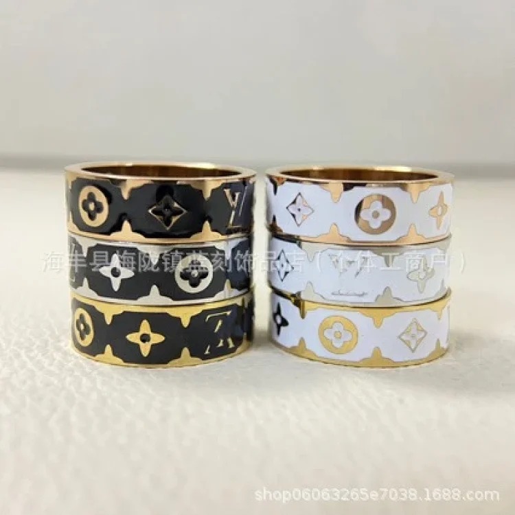 New letter pattern enamel ring, simple, fashionable and niche design, versatile titanium steel ring pair