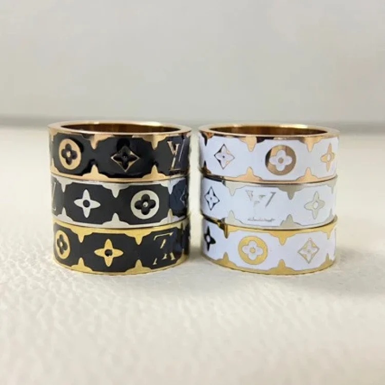 New letter pattern enamel ring, simple, fashionable and niche design, versatile titanium steel ring pair