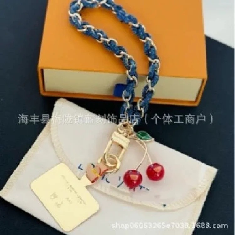Louis Vuitton New red strawberry pendant wool braided keychain cherry denim old flower bag pendant