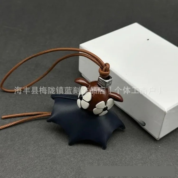 Luojia Xiaohei black first-layer cowhide elf pendant car keychain pendant bag pendant exquisite leather art