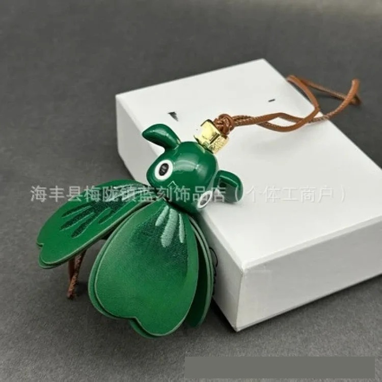 Luojia Xiaohei black first-layer cowhide elf pendant car keychain pendant bag pendant exquisite leather art
