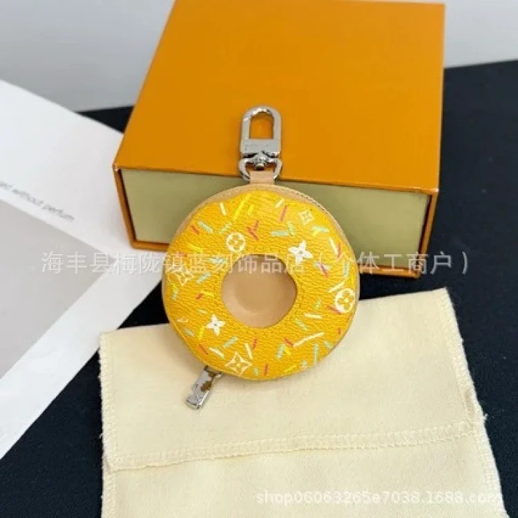 Louis Vuitton New donut bag pendant light luxury niche genuine leather pendant snack simulation splicing old flower bag pendant