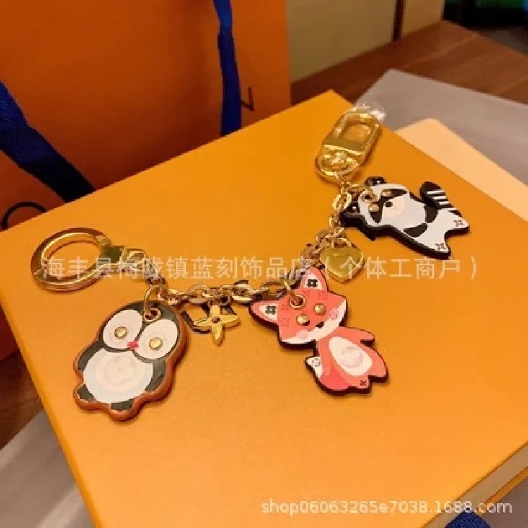 Cross-border versatile simple commuting personalized floral leather braided rope bag hanging keychain box car bag keychain