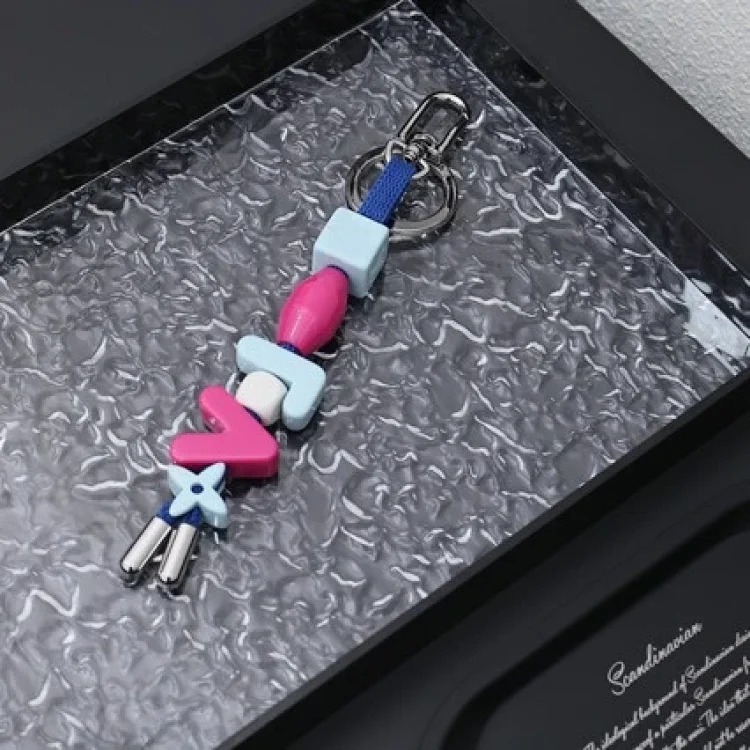 Cross-border versatile simple commuting personalized floral leather braided rope bag hanging keychain box car bag keychain