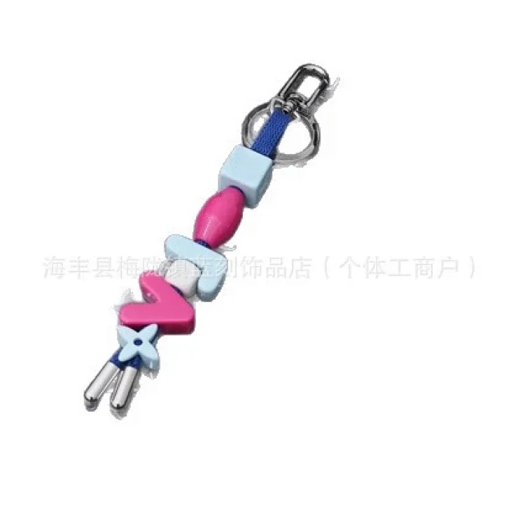 Cross-border versatile simple commuting personalized floral leather braided rope bag hanging keychain box car bag keychain