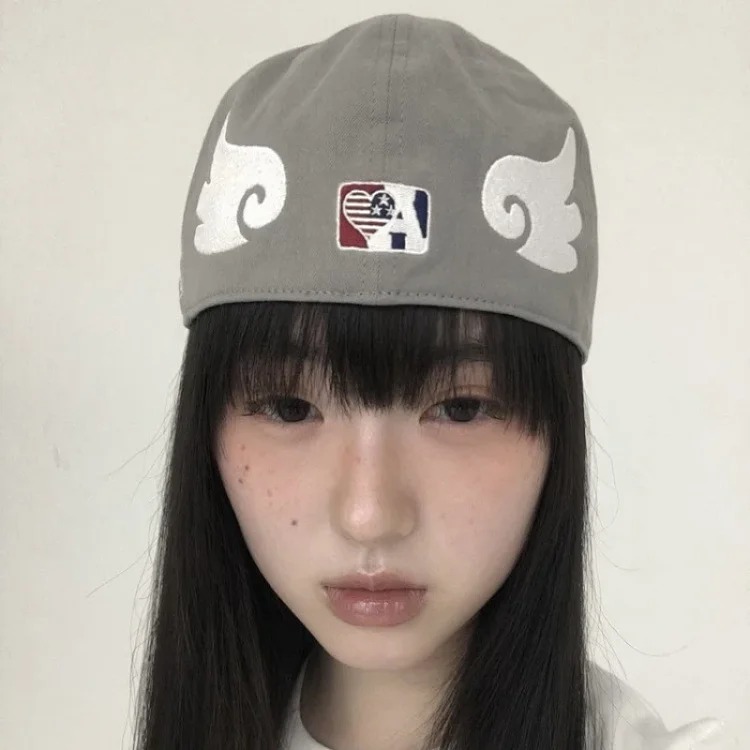 Korean niche aeae angel wings camouflage embroidery ins same style sun protection baseball cap peaked cap