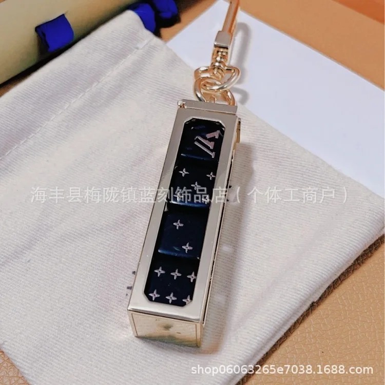 Trendy brand dice square keychain pendant bag chain titanium steel fashion mini bag foreign trade exclusive for drop shipping