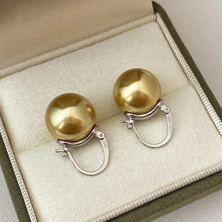Dong Qing's same style bucket Shijia oversized pearl earrings 2025 new high-end light luxury S925 silver teapot earrings