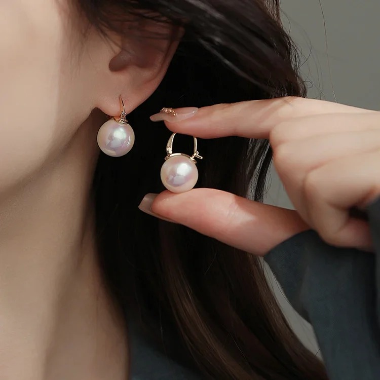 Dong Qing's same style bucket Shijia oversized pearl earrings 2025 new high-end light luxury S925 silver teapot earrings