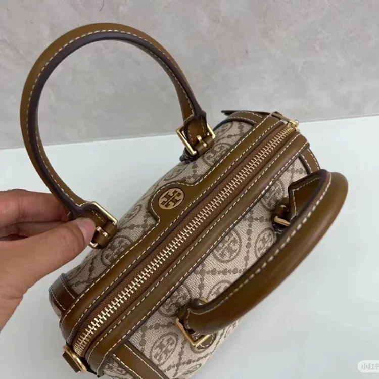 Louis Vuitton Torty Burch retro old flower canvas barrel bag fashion trend portable bowling bag casual Boston bag