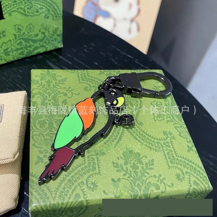 Gucci Gujia double G parrot keychain creative pendant cartoon keychain alloy accessories new Zi key chain pendant