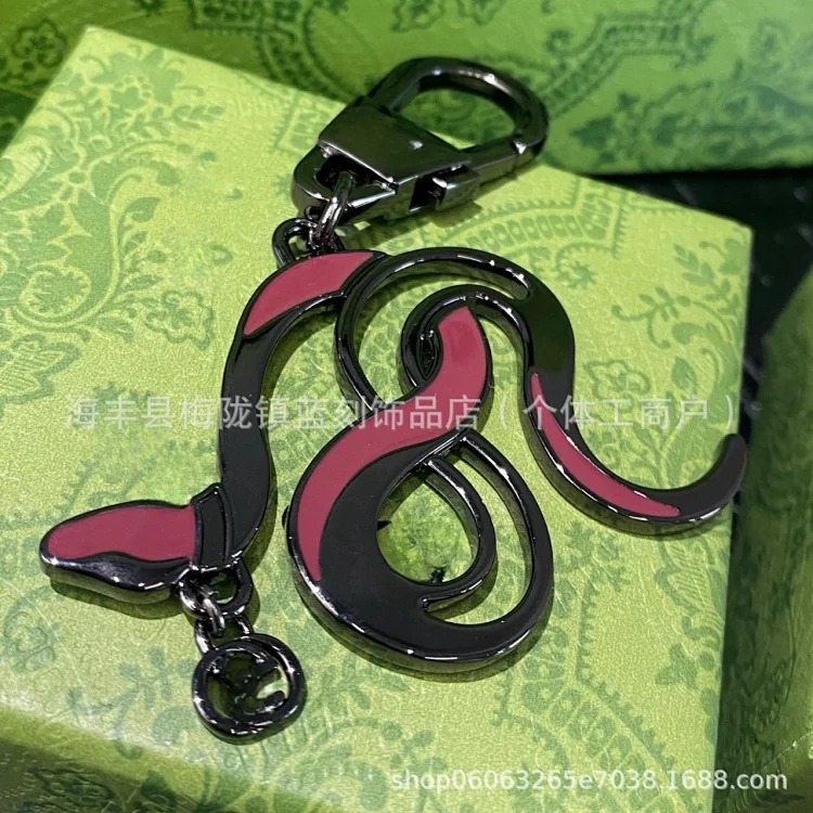 Gucci Gujia double G parrot keychain creative pendant cartoon keychain alloy accessories new Zi key chain pendant