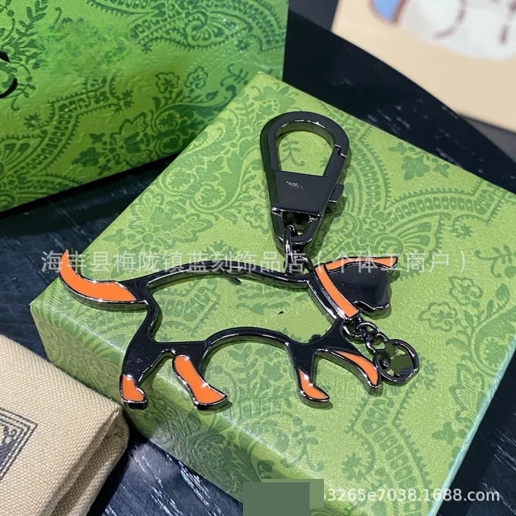 Gucci Gujia double G parrot keychain creative pendant cartoon keychain alloy accessories new Zi key chain pendant