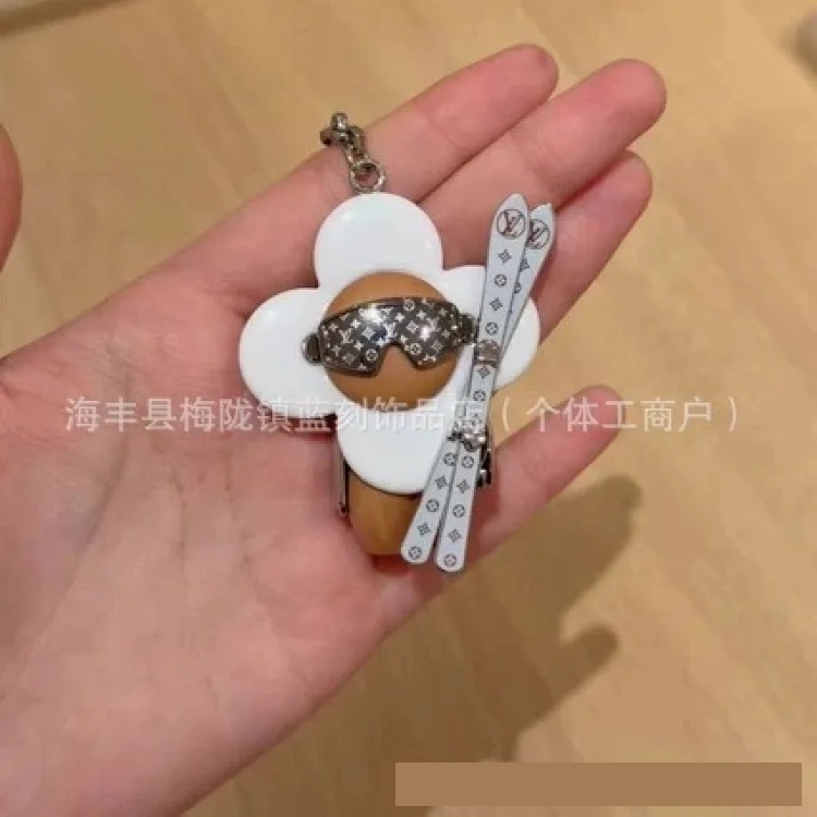 Hermes New cross-border best-selling Vivian keychain sunflower bag charm personalized leather bag chain one generation