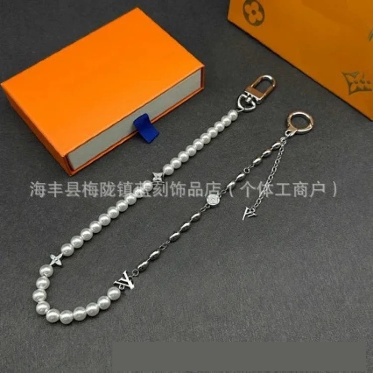 Letter jewelry bag hanging wholesale keychain pendant bag chain trendy brand titanium steel bag chain dropshipping