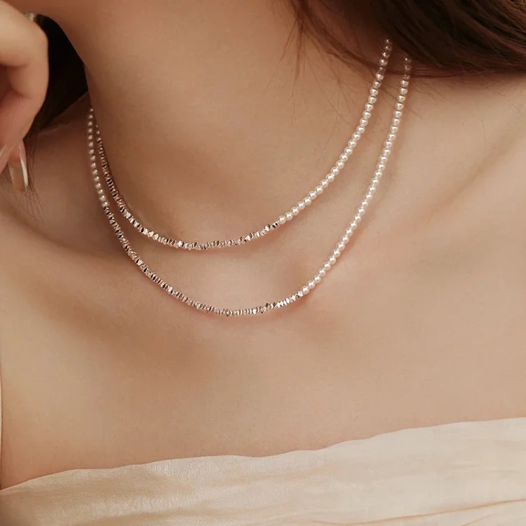 Explosive broken silver pearl necklace double layer stacked light luxury niche millet bead necklace long sweater chain for women