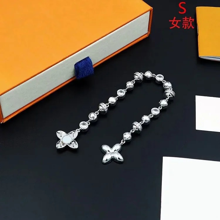 Cross-border popular four-leaf clover with diamond beads European and American punk Xiha versatile men and women clavicle necklace bracelet