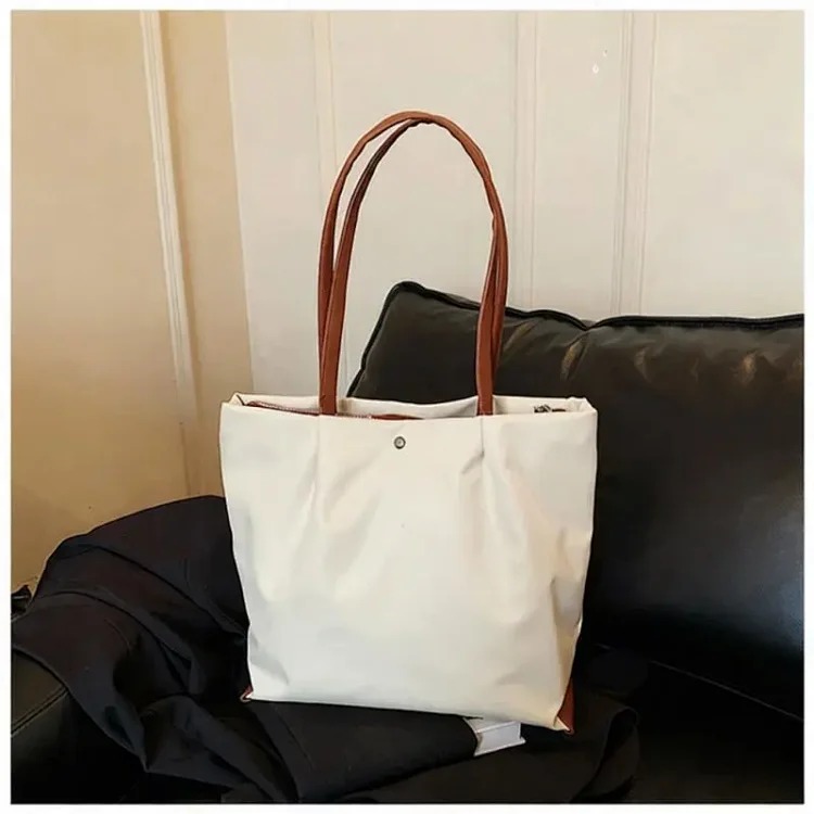 2026 New Women's Bag Large Capacity Casual Commuting Shoulder Bag Women's Lightweight Simple Portable Fashion Temperament Tote Bag