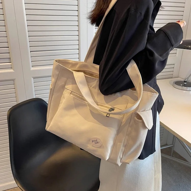 Solid Color Women's Shoulder Bag Casual Large Capacity Tote Bag Women's New Versatile Commuting Tuition Portable Crossbody Bag