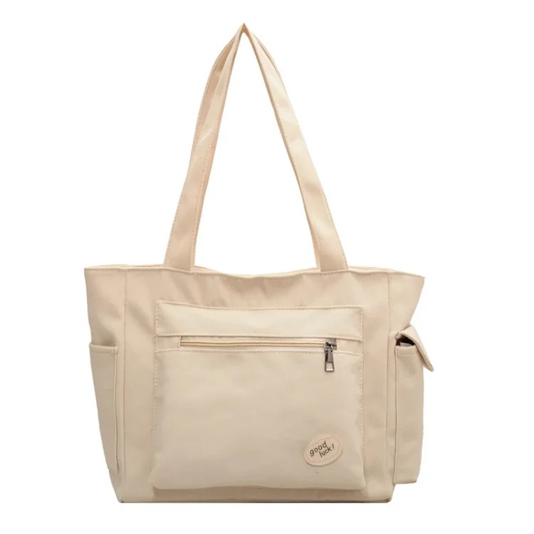 Solid Color Women's Shoulder Bag Casual Large Capacity Tote Bag Women's New Versatile Commuting Tuition Portable Crossbody Bag