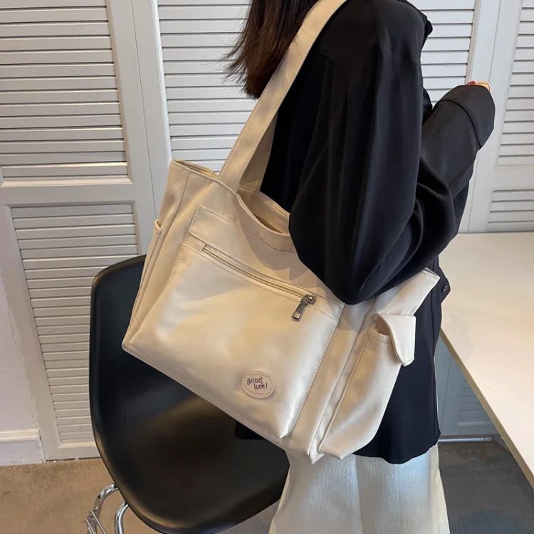 Solid Color Women's Shoulder Bag Casual Large Capacity Tote Bag Women's New Versatile Commuting Tuition Portable Crossbody Bag