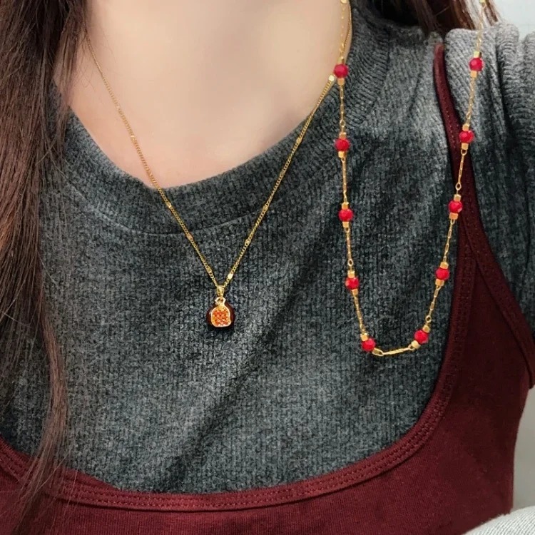 Red oil-dropping pomegranate pendant double-layer stacked necklace for women, niche design, light luxury, high-end sweater chain