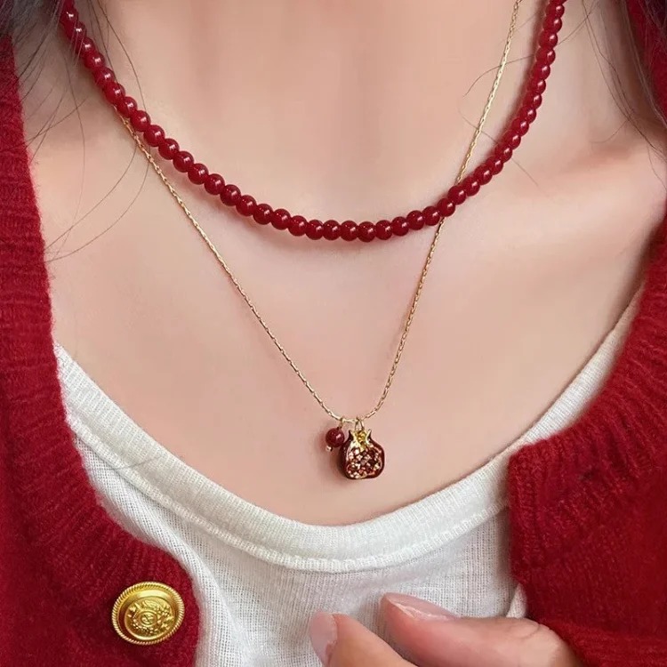 Red oil-dropping pomegranate pendant double-layer stacked necklace for women, niche design, light luxury, high-end sweater chain
