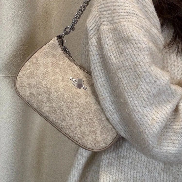 Louis Vuitton Teri24 Crescent Underarm Bag Classic Old Flower Fragrant Breed Shoulder Bag for Women