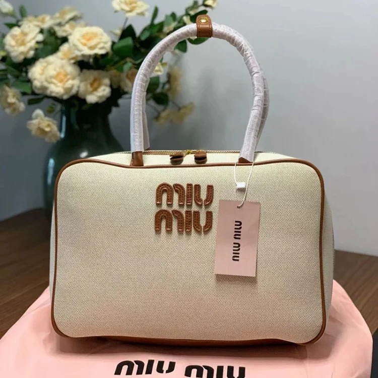 Miu 2024 new bowling briefcase large capacity portable shoulder crossbody bag fashionable commuter women's bag trend