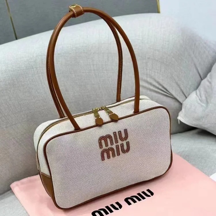 Miu 2024 new bowling briefcase large capacity portable shoulder crossbody bag fashionable commuter women's bag trend