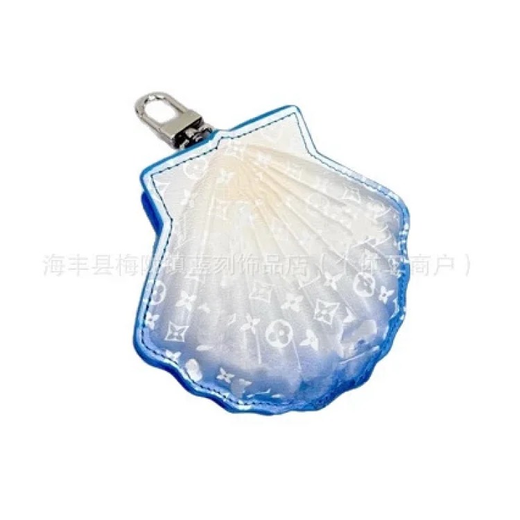 Cross-border Vivian keychain handmade genuine leather sunflower bag pendant four-leaf clover metal doll pendant