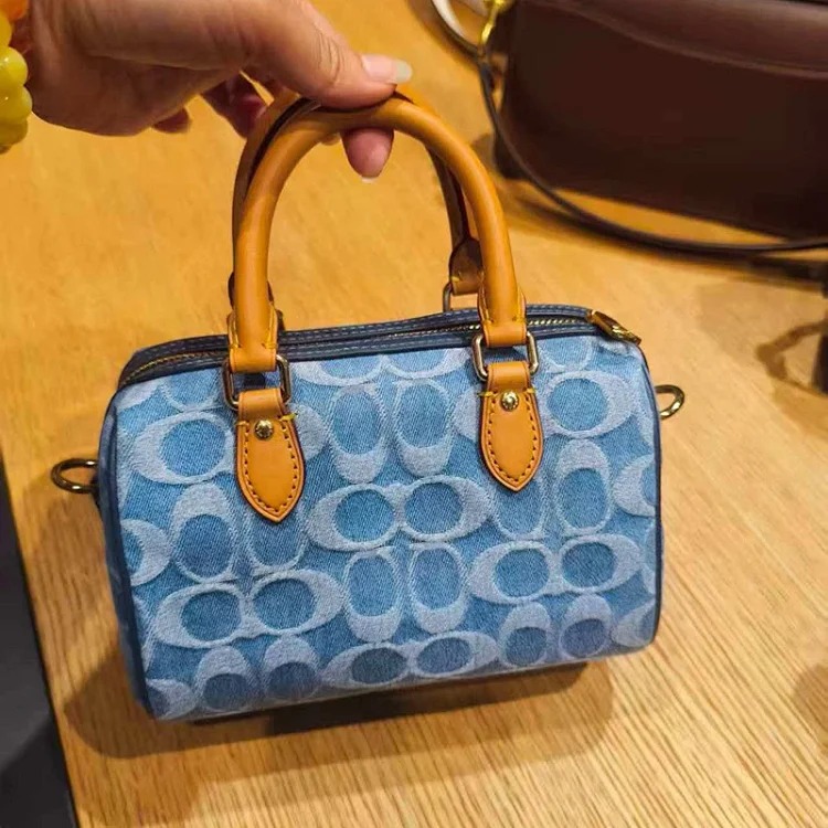 Louis Vuitton Outlet bag women's 2026 new MINI ROWAN Boston small handbag retro presbyopic crossbody bag