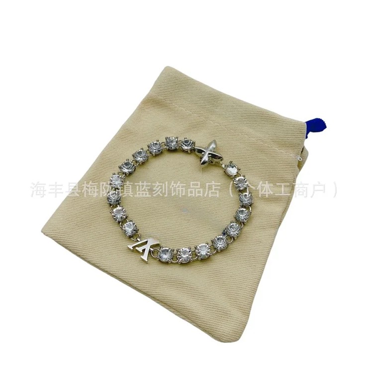 Cross-border popular rhinestone letter bracelet for men and women, hip-hop European and American style titanium steel material factory wholesale