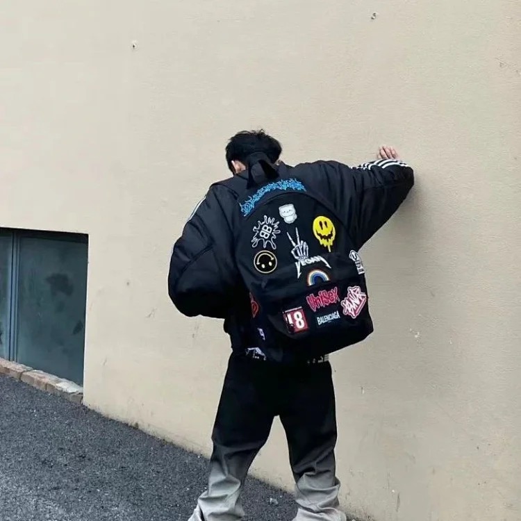 22SS Explorer alien logo embroidery graffiti sticker backpack backpack 2025new