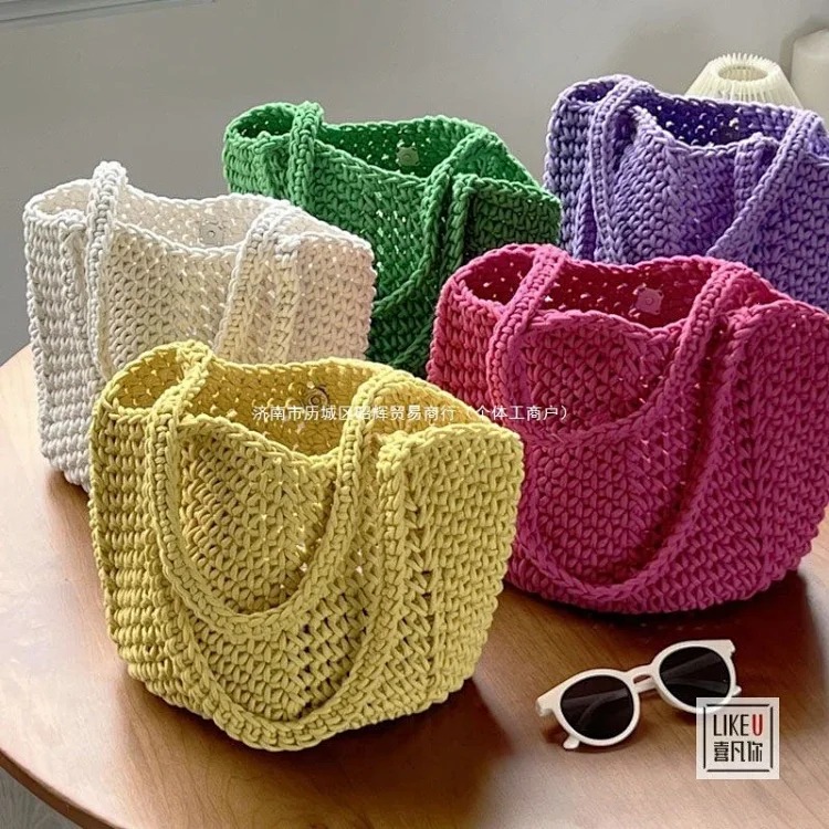 Hand-woven Korean style lazy style hand-held shoulder bag forest solid color hand-woven cotton rope hollow bag bucket XF