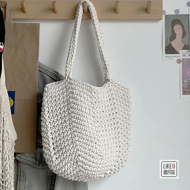 Hand-woven Korean style lazy style hand-held shoulder bag forest solid color hand-woven cotton rope hollow bag bucket XF image 2