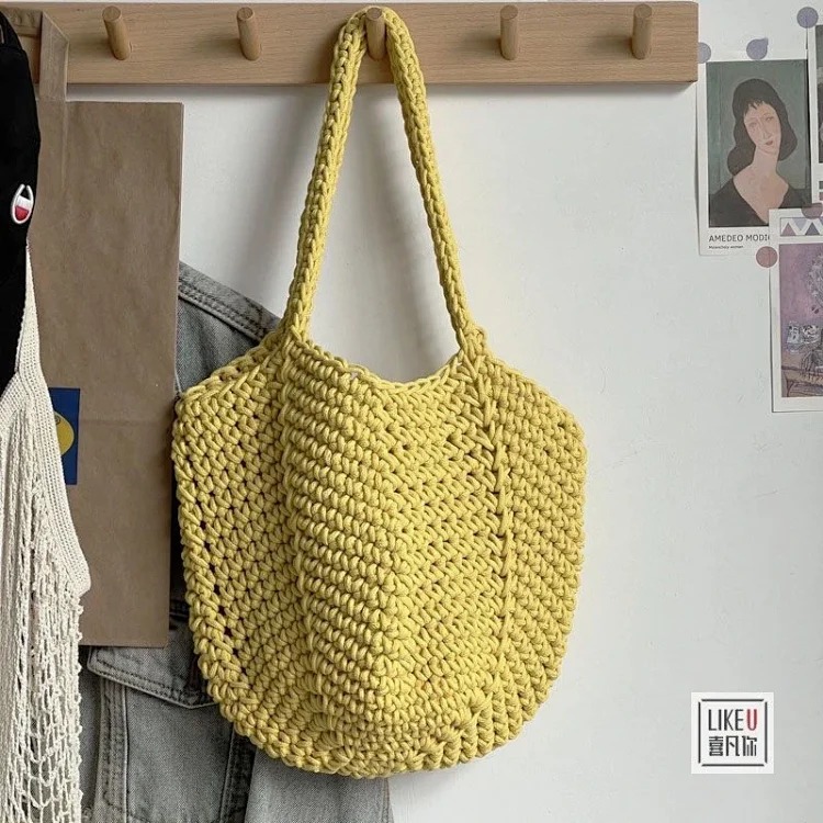 Hand-woven Korean style lazy style hand-held shoulder bag forest solid color hand-woven cotton rope hollow bag bucket XF image 3